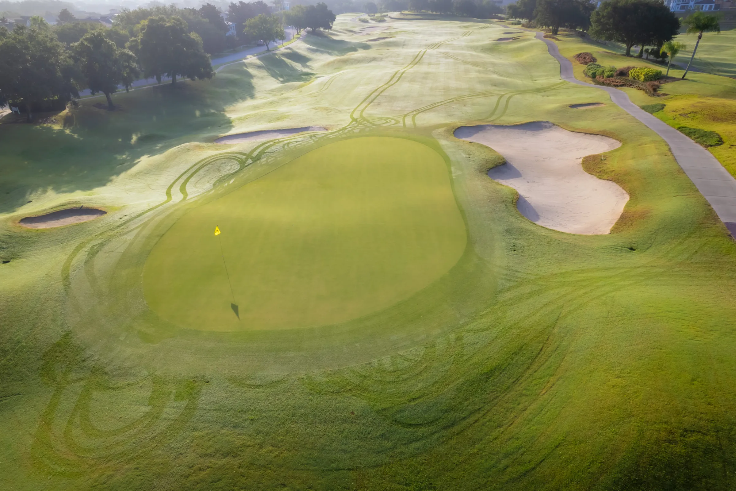 Aerial golf green vacation rental community photography by REMIX