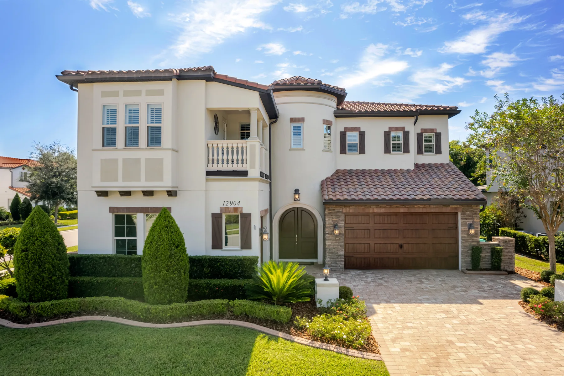 Luxury Mediterranean two-story home exterior real estate photography in Windermere Florida by REMIX Real Estate Media 9 - HDR listing photo